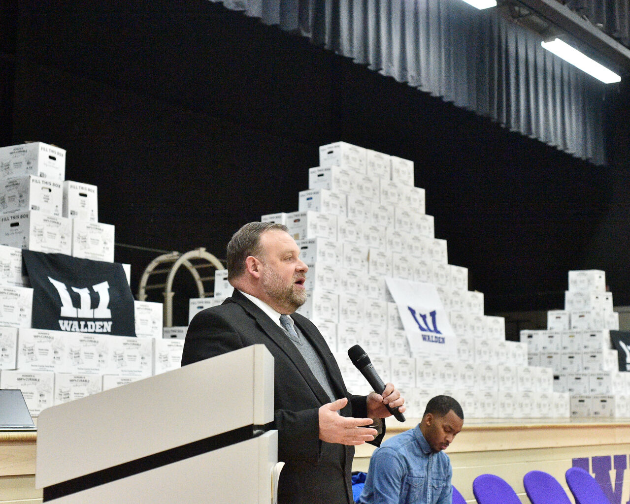 Mayor Mason with the boxes of food.